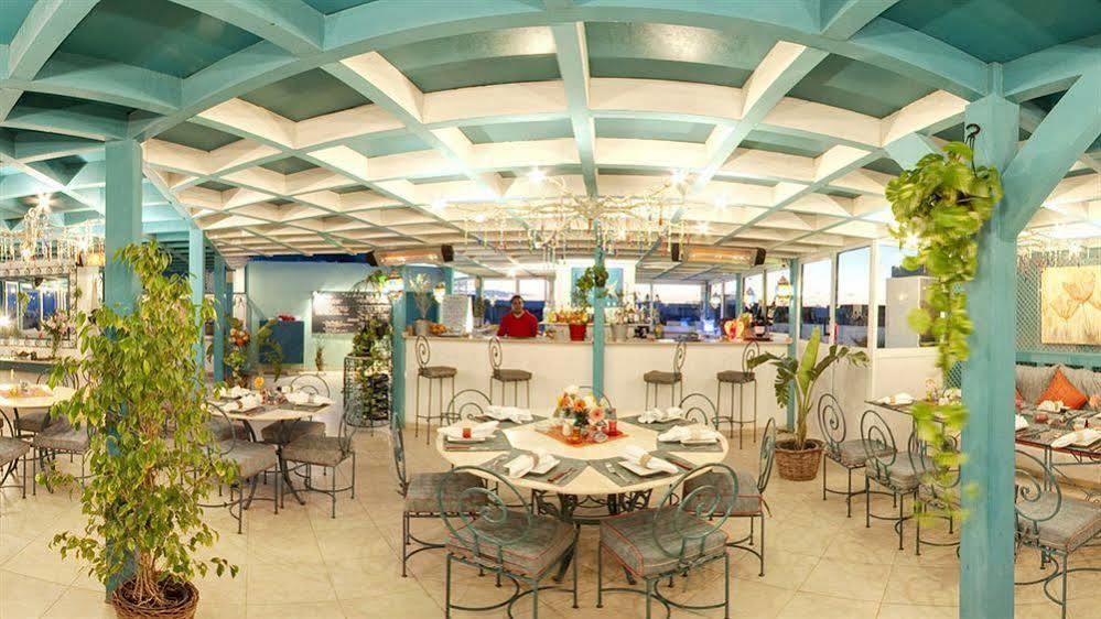 Turtle'S Inn Hotel Хургада Экстерьер фото